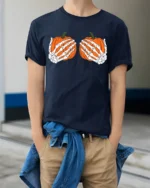 Funny Skeleton Hands Holding Pumpkins Halloween Spooky Graphic T Shirt - model wearing navy tee with hands in pockets