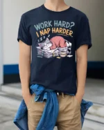 Funny Work Hard Nap Harder Cat Graphic T Shirt Lazy Humor - model wearing navy tee with hands in pockets