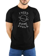 I Need Some Space Funny Planet Minimalist Graphic T Shirt - model wearing black tee with hands behind back