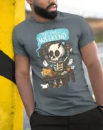 Yay Finally Weekend Funny Skeleton Work Humor Graphic T Shirt - model wearing grey tee, leaning on column