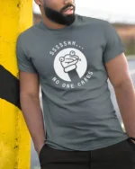 Sarcastic Ssssh No One Cares Meme Frog Funny T Shirt - model wearing grey tee, leaning on column