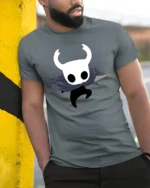 Cute Ghost Knight Cartoon Graphic T Shirt Fantasy Gamer Style Tee - model wearing grey tee, leaning on column