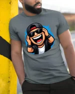 Funny DJ Cartoon Character Graphic T Shirt Music Party Style Tee - model wearing grey tee, leaning on column