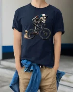 Cool Skeleton Riding Bike Graphic T Shirt Gothic Sport Style Tee - model wearing navy tee with hands in pockets