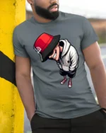 Cool Streetwear Cartoon Graphic T Shirt Urban Style Fashion Tee - model wearing grey tee, leaning on column