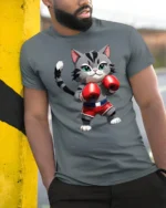 Cute Boxing Cat Graphic T Shirt Funny Fighter Style Animal Tee - model wearing grey tee, leaning on column