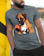 Strong Boxing Dog Graphic T Shirt Cool Fighter Style Tee - model wearing grey tee, leaning on column