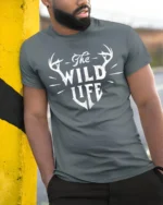 The Wild Life Deer Antlers Graphic T Shirt Rustic Nature Style Tee - model wearing grey tee, leaning on column