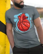 Anatomical Heart Basketball Graphic T Shirt Creative Sport Tee - model wearing grey tee, leaning on column