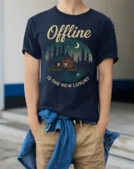 Offline Is The New Luxury Graphic Tee Nature Cabin Tshirt - model wearing navy tee with hands in pockets