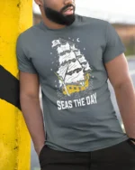 Seas The Day Pirate Ship Graphic Tee Funny Sailing Tshirt - model wearing grey tee, leaning on column