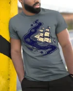 Cosmic Sailing Ship Graphic Tee Space Ocean Fantasy Tshirt - model wearing grey tee, leaning on column