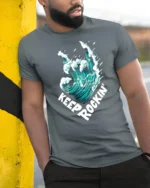 Keep Rocking Wave Graphic Tee Cool Ocean Music Tshirt - model wearing grey tee, leaning on column