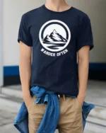 Wander Often Mountain Adventure Graphic Tee Outdoor Tshirt - model wearing navy tee with hands in pockets