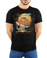 Funny Summer Crocodile Surf Graphic Tee Beach Vibes Tshirt - model wearing black tee with hands behind back