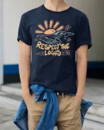 Respect The Locals Whale Tshirt Funny Ocean Nature Graphic - model wearing navy tee with hands in pockets
