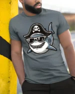 Funny Pirate Shark Tshirt Cool Ocean Cartoon Humor Graphic - model wearing grey tee, leaning on column