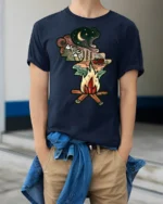 Camping Campfire Mountain Night Adventure Graphic Tshirt Nature Style - model wearing navy tee with hands in pockets