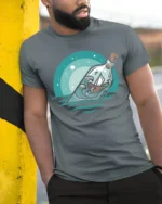 Ocean Message Bottle Ship Graphic Tshirt Calm Sea Adventure Style - model wearing grey tee, leaning on column