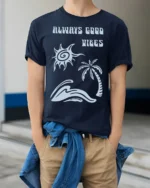 Always Good Vibes Retro Beach Wave Positive Graphic Tee - model wearing navy tee with hands in pockets
