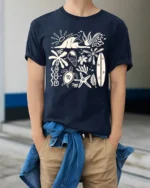 Retro Beach Icons Ocean Summer Coastal Graphic Tee - model wearing navy tee with hands in pockets