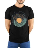 Live Wild Ocean Wave Nature Adventure Artistic Graphic Tee - model wearing black tee with hands behind back