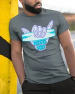 Kite Surf Shaka Hand Sign Ocean Adventure Graphic Tee - model wearing grey tee, leaning on column