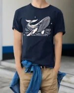 Minimalist Whale Ocean Night Sky Artistic Graphic Tee Tshirt - model wearing navy tee with hands in pockets