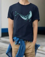 Monterey Bay Whale Ocean Coastal Travel Graphic Tee Tshirt - model wearing navy tee with hands in pockets