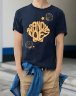 Sandy Toes Beach Vacation Summer Graphic Tee Tshirt Style - model wearing navy tee with hands in pockets
