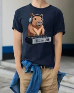 Funny DJ Capybara Music Lover Animal Graphic Tee Tshirt - model wearing navy tee with hands in pockets