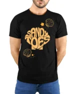 Sandy Toes Beach Vacation Summer Graphic Tee Tshirt Style - model wearing black tee with hands behind back