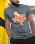 Vintage Texas Desert Landscape Western Style Graphic Tee Tshirt - model wearing grey tee, leaning on column