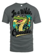 In A While Crocodile Funny Vacation Graphic Tee Beach Humor - gray t-shirt on white background