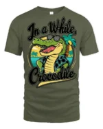 In A While Crocodile Funny Vacation Graphic Tee Beach Humor - military green t-shirt on white background