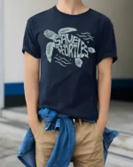Save The Turtles Ocean Conservation Graphic Tee Nature Style - model wearing navy tee with hands in pockets