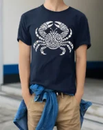 Tribal Crab Ocean Graphic Tee Artistic Marine Life Style - model wearing navy tee with hands in pockets