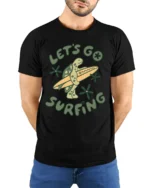 Lets Go Surfin Turtle Funny Beach Graphic Tee Retro Style - model wearing black tee with hands behind back
