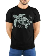 Save The Turtles Ocean Conservation Graphic Tee Nature Style - model wearing black tee with hands behind back