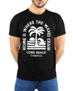 Long Beach California Waves Graphic Tee Retro Coastal Style - model wearing black tee with hands behind back