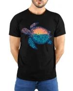 Sea Turtle Sunset Ocean Life Graphic Tee Coastal Aesthetic - model wearing black tee with hands behind back