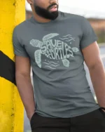 Save The Turtles Ocean Conservation Graphic Tee Nature Style - model wearing grey tee, leaning on column