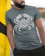 Tribal Crab Ocean Graphic Tee Artistic Marine Life Style - model wearing grey tee, leaning on column