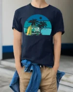 Vintage Surf Van Beach Sunset Graphic Tee Retro Summer Style - model wearing navy tee with hands in pockets