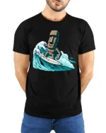 Funny Surfing Moai Statue Graphic Tee Retro Beach Humor Style - model wearing black tee with hands behind back