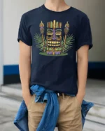 Retro Tiki Mask Tropical Graphic Tee Island Culture Style - model wearing navy tee with hands in pockets