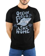 Ocean Feels Like Home Graphic Tee Coastal Beach Lover Style - model wearing black tee with hands behind back