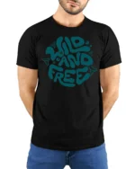 Wild And Free Retro Typography Graphic Tee Adventure Vibes - model wearing black tee with hands behind back