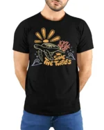 Save The Turtles Ocean Graphic Tee Marine Life Awareness - model wearing black tee with hands behind back