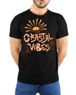 Coastal Vibes Retro Sunset Graphic Tee Beach Aesthetic Style - model wearing black tee with hands behind back